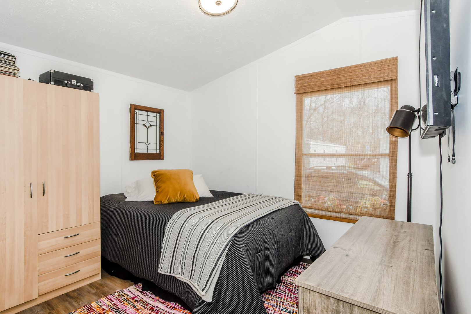 58 Oak Street Minooka, IL 60447 - Photo 13 of 28 a bedroom with a bed and wooden floor