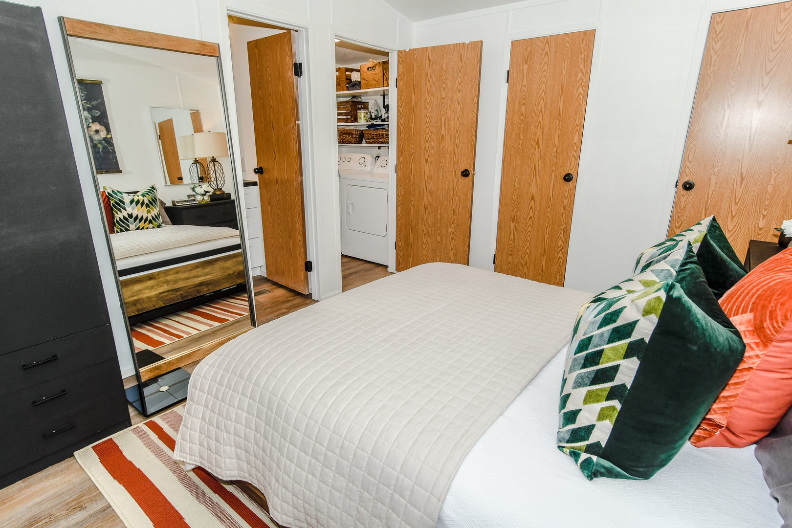 58 Oak Street Minooka, IL 60447 - Photo 17 of 28 a bedroom with a bed and a mirror on the dresser