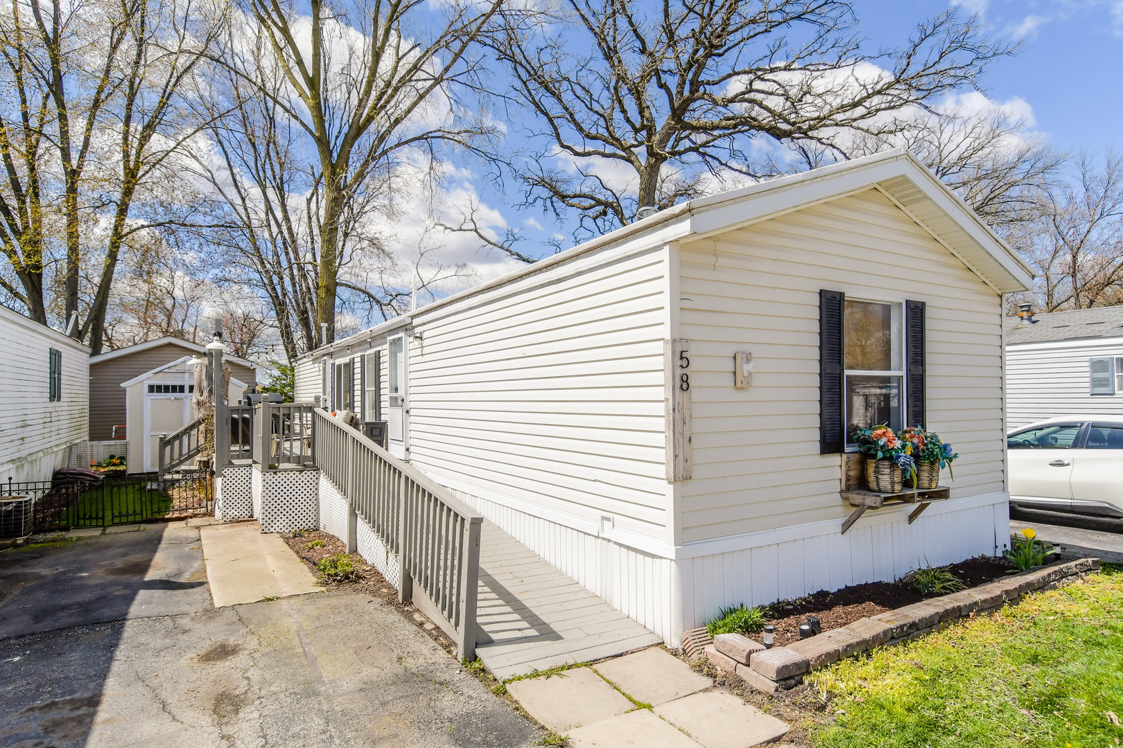 58 Oak Street Minooka, IL 60447 - Photo 2 of 28 a view of a house with a yard