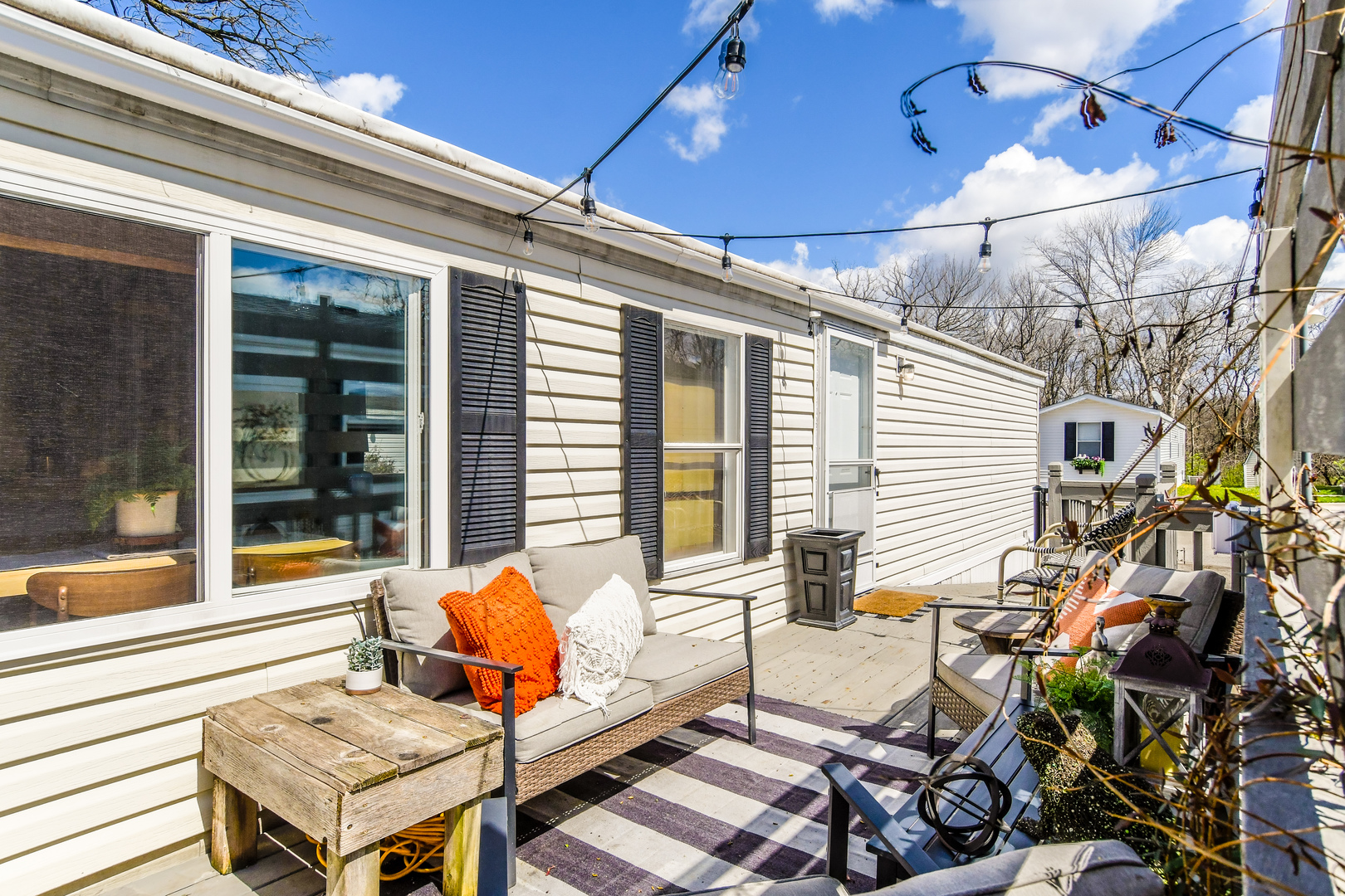 58 Oak Street Minooka, IL 60447 - Photo 24 of 28 a outdoor space with patio the couches and a dining table with the view of the balcony