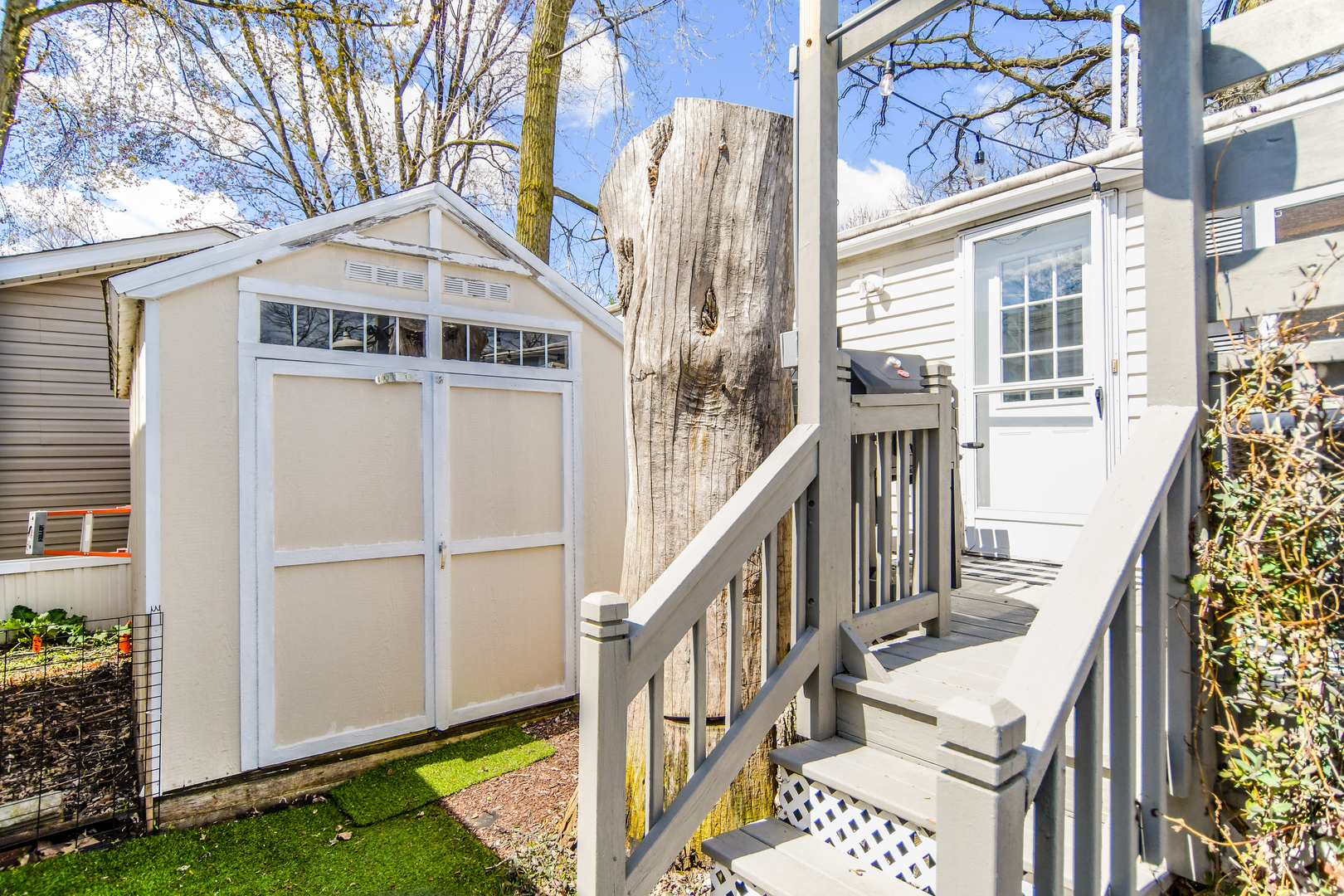 58 Oak Street Minooka, IL 60447 - Photo 27 of 28 a view of a house with a small yard and wooden fence