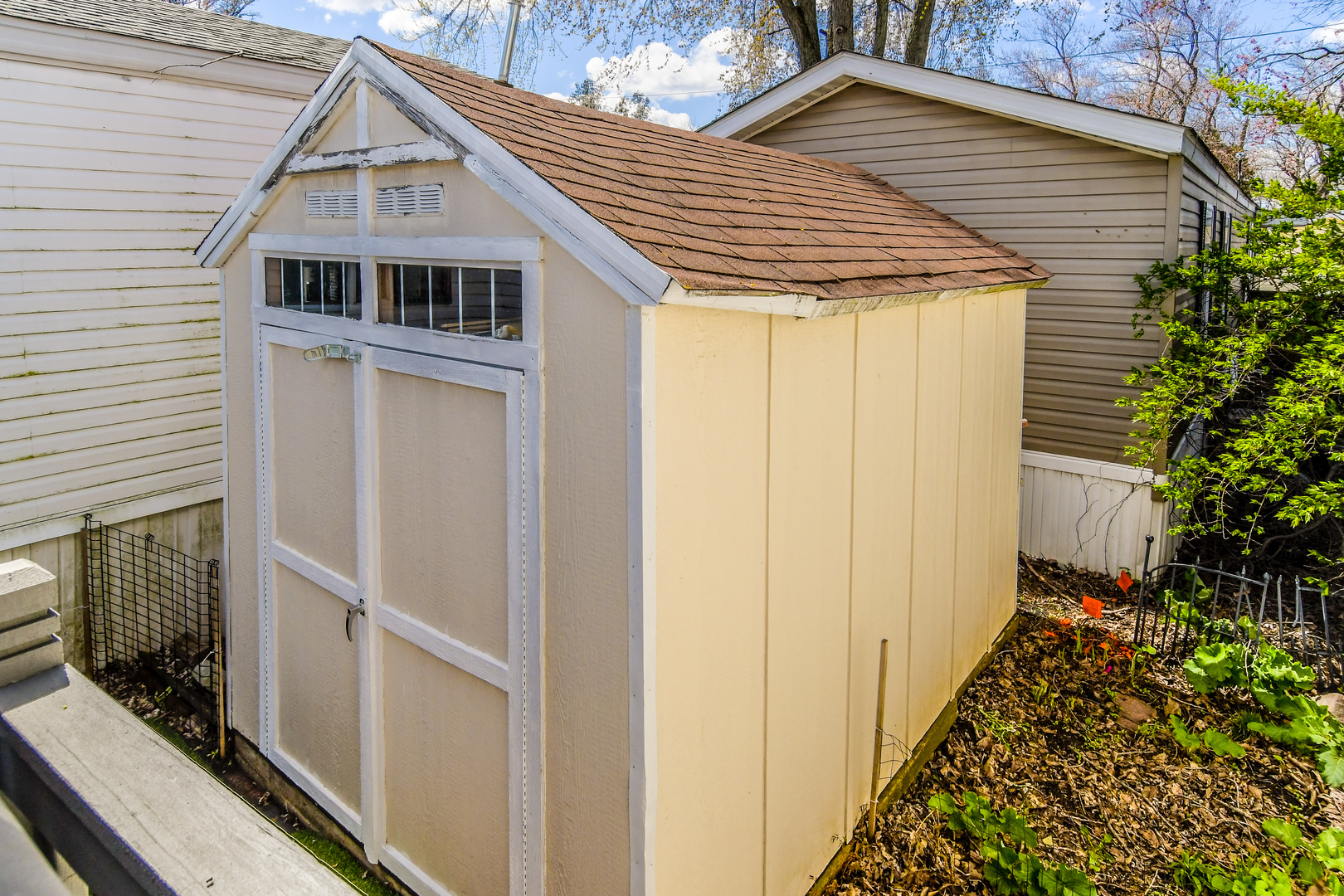 58 Oak Street Minooka, IL 60447 - Photo 28 of 28 a view of a house with wooden walls