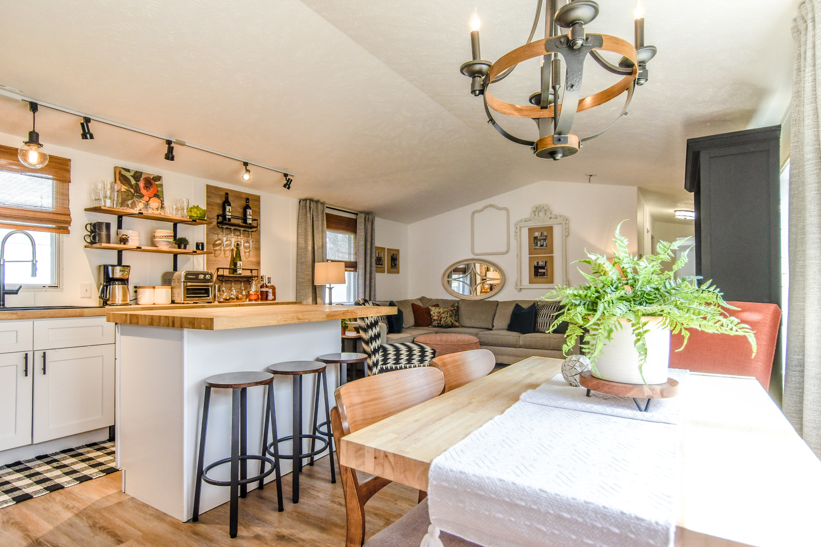 58 Oak Street Minooka, IL 60447 - Photo 8 of 28 a living room with furniture a chandelier and wooden floor