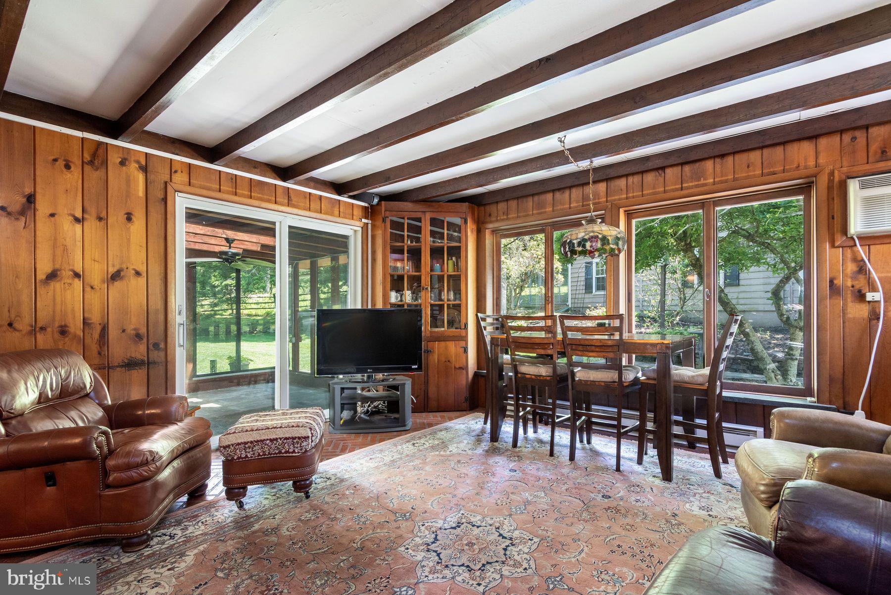 2349 Valley Road Jamison, PA 18929 - Photo 25 of 53 a living room with furniture a flat screen tv and large windows