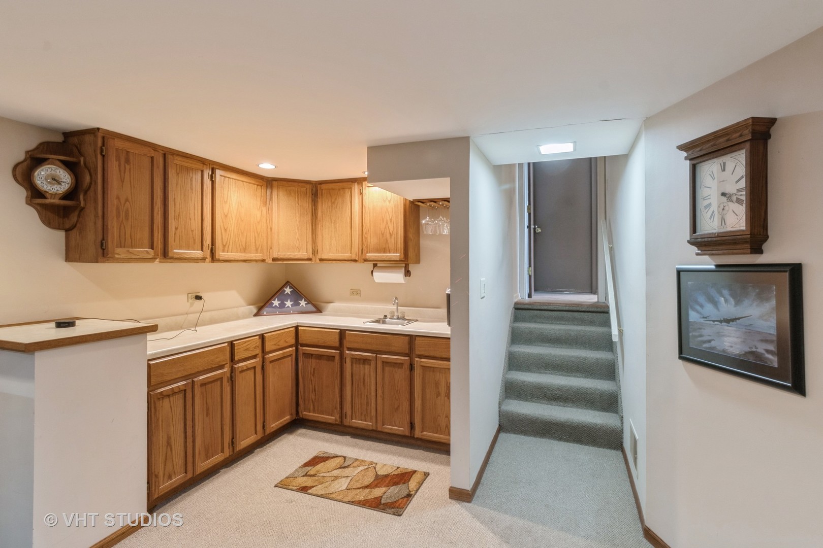 1061 Warwick Circle North Hoffman Estates, IL 60169 - Photo 11 of 18 a kitchen with a sink and cabinets