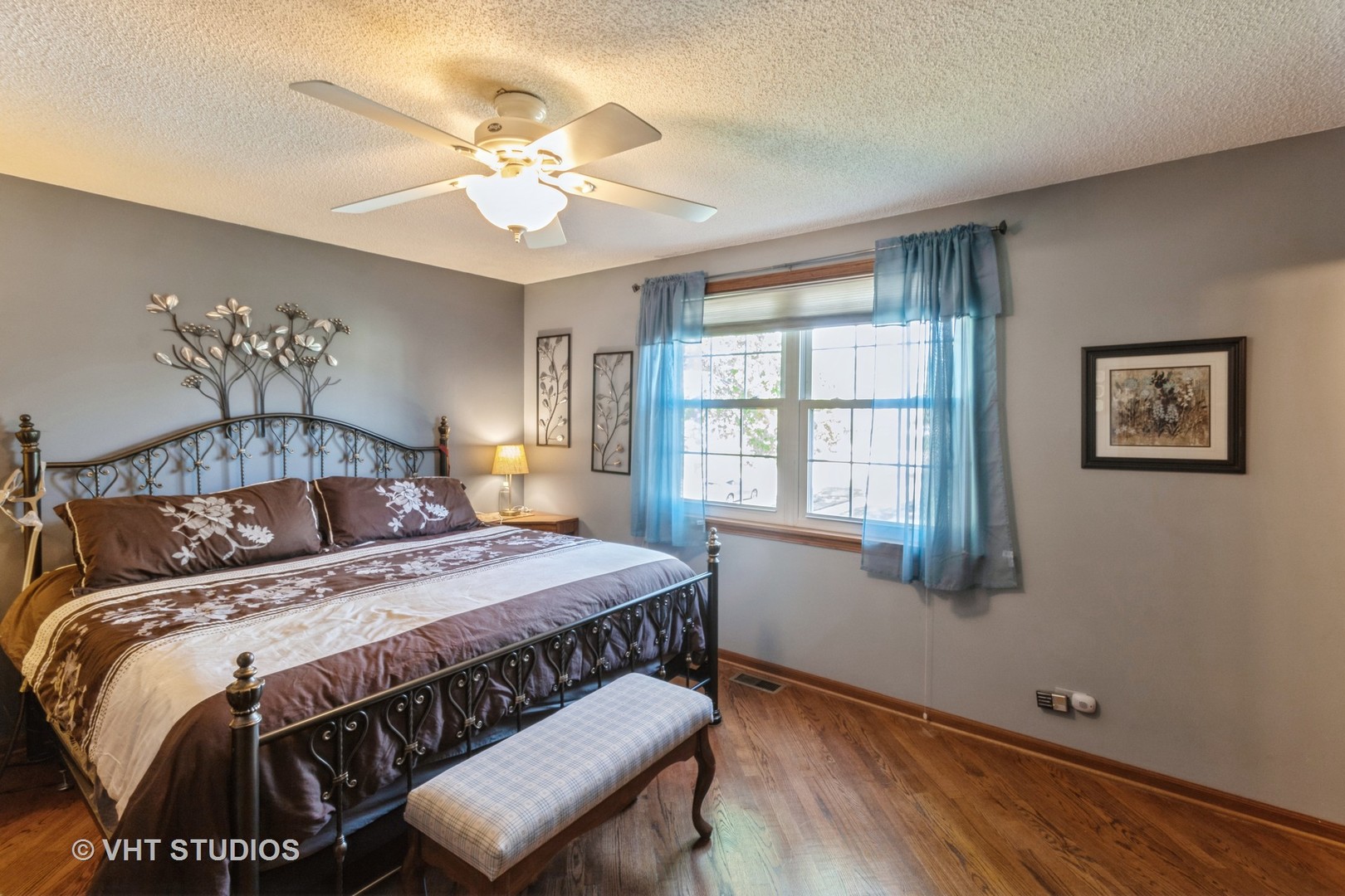 1061 Warwick Circle North Hoffman Estates, IL 60169 - Photo 15 of 18 a bedroom with a bed and a window