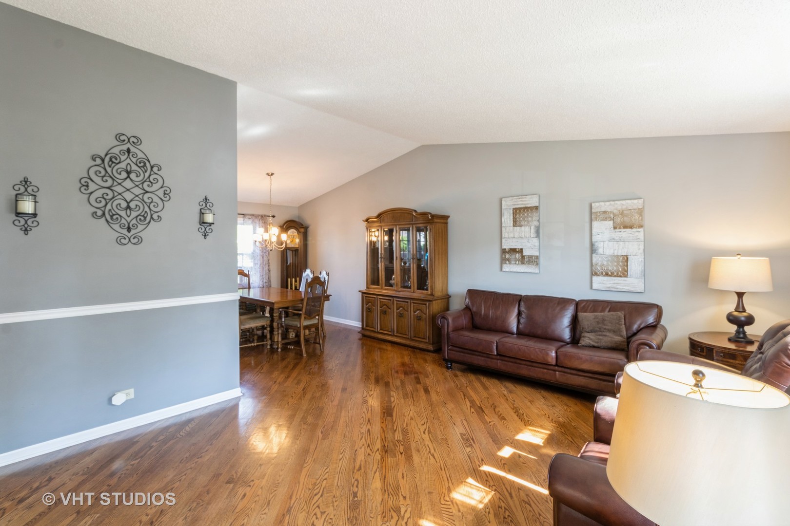 1061 Warwick Circle North Hoffman Estates, IL 60169 - Photo 6 of 18 a living room with furniture and a wooden floor