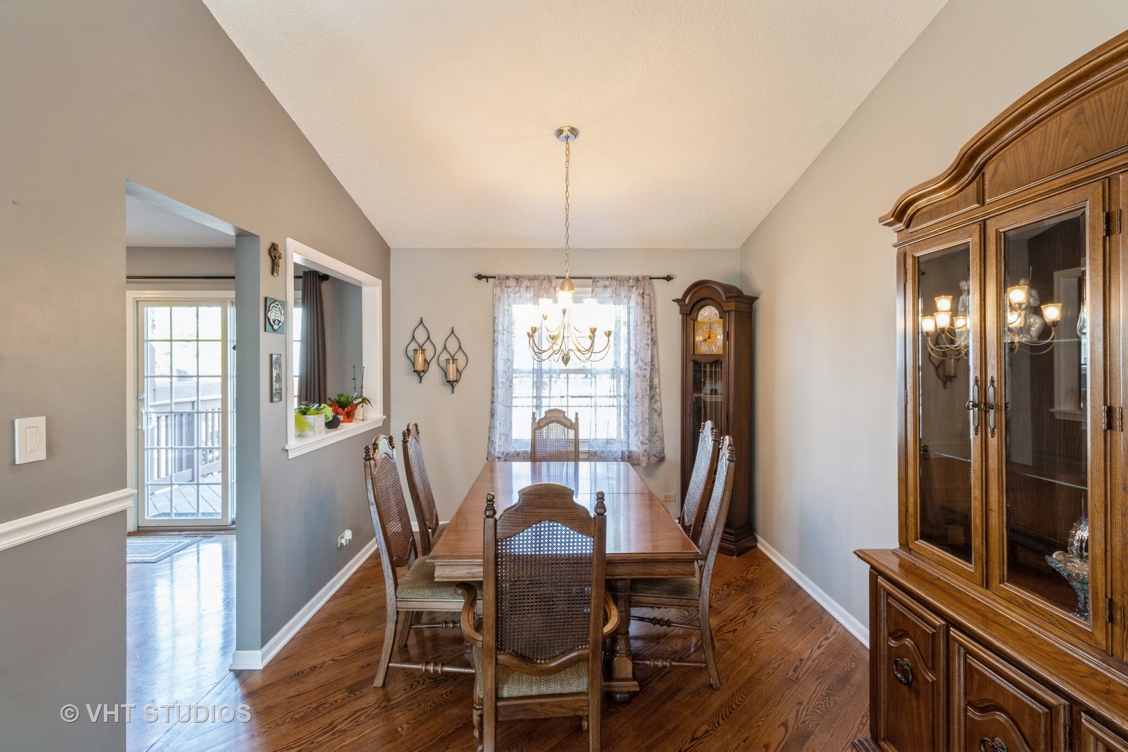 1061 Warwick Circle North Hoffman Estates, IL 60169 - Photo 7 of 18 a view of a dining room with furniture window and wooden floor