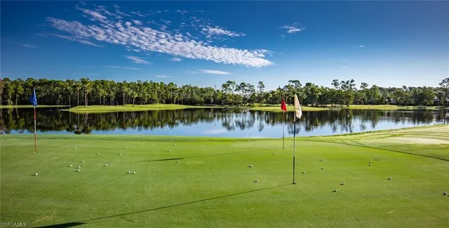 a view of a lake with a big yard
