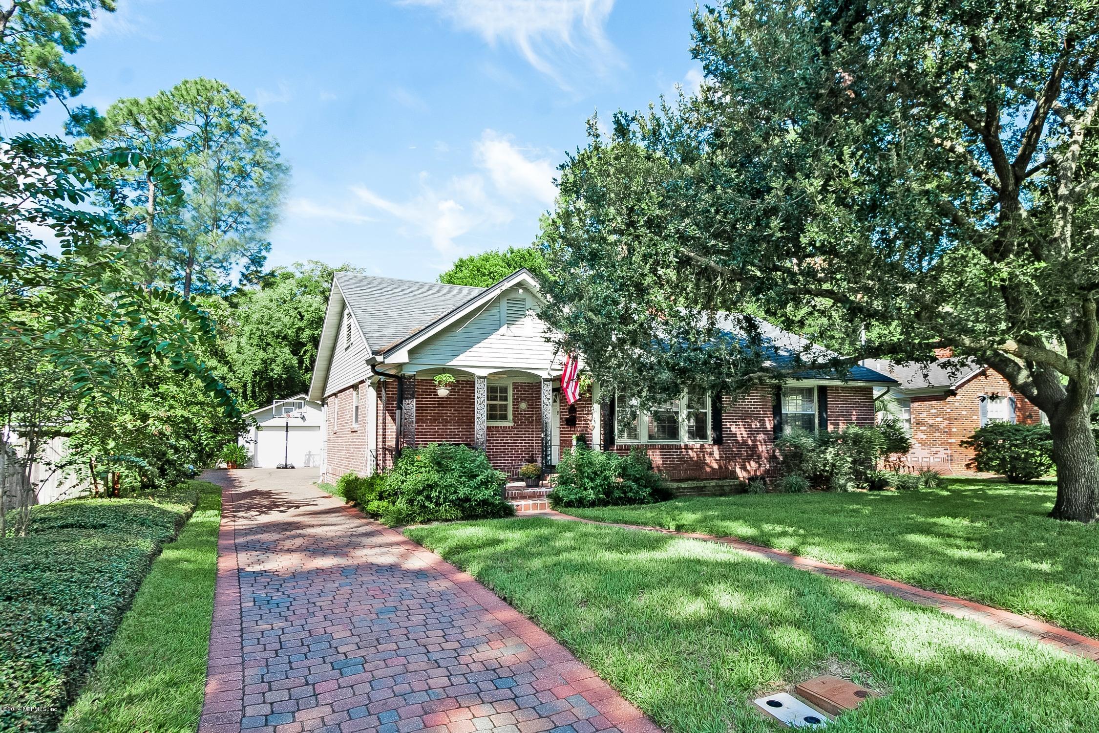 1446 Nicholson Road Jacksonville, FL 32207 - Photo 1 of 27 a front view of house with yard and green space