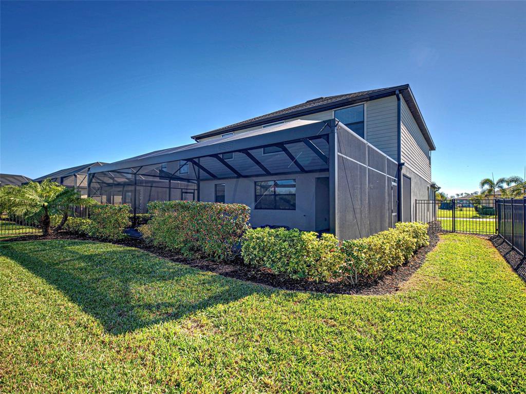 1824 East Isles Rd Port Port Charlotte, FL 33953 - Photo 12 of 80 a view of a backyard of the house