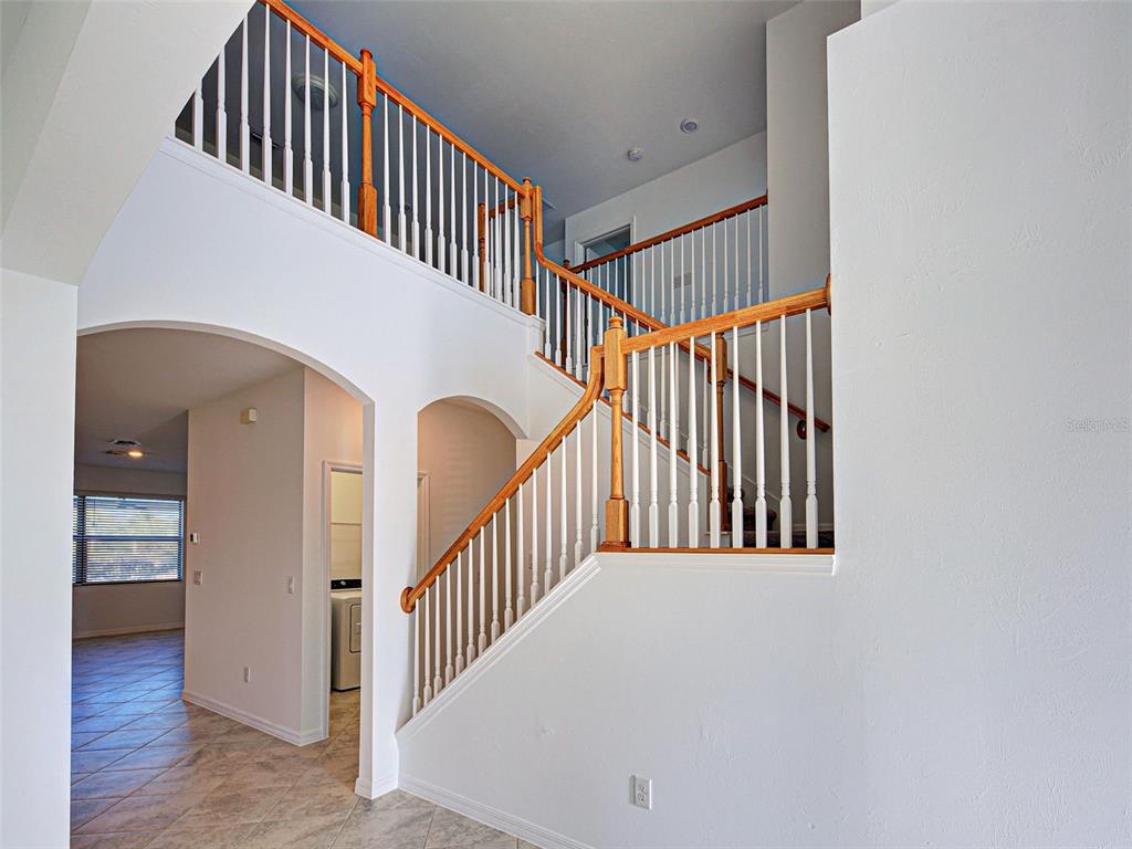 1824 East Isles Rd Port Port Charlotte, FL 33953 - Photo 21 of 80 a view of entryway and hall with wooden floor