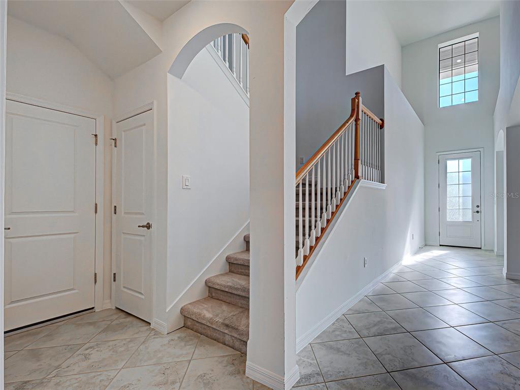 1824 East Isles Rd Port Port Charlotte, FL 33953 - Photo 45 of 80 a view of an entryway with staircase