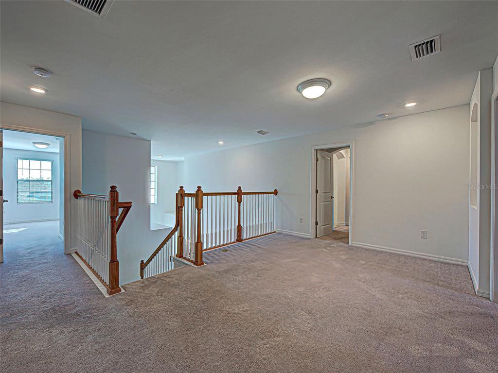 1824 East Isles Rd Port Port Charlotte, FL 33953 - Photo 46 of 80 an empty room with windows