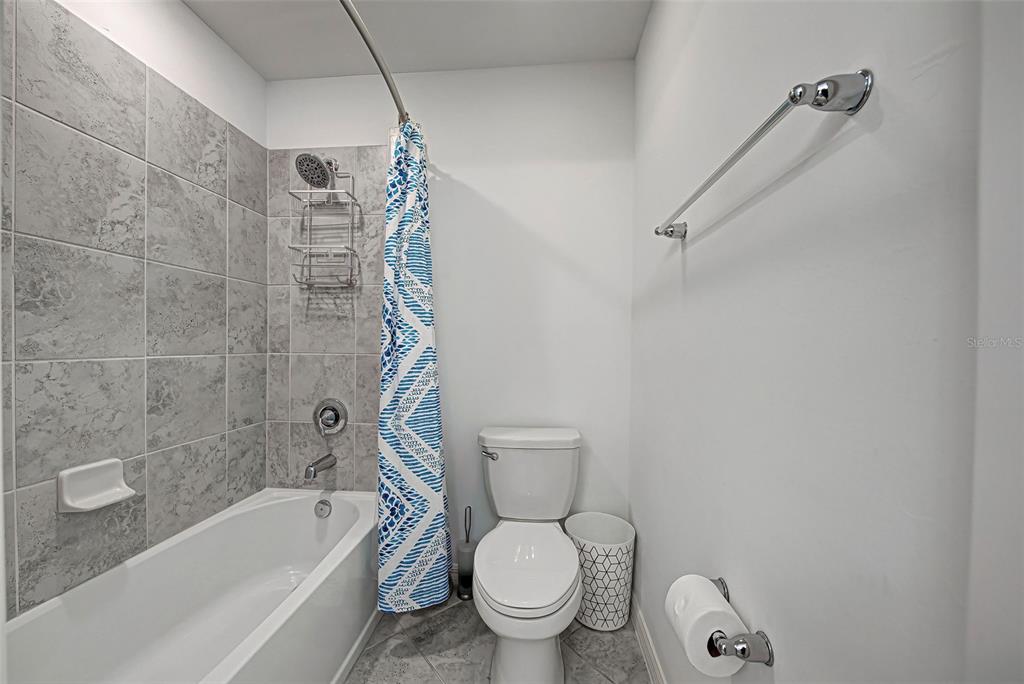 1824 East Isles Rd Port Port Charlotte, FL 33953 - Photo 55 of 80 a bathroom with a toilet and a shower