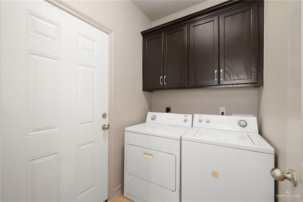 1214 Cornerstone Loop Rio Grande City, TX 78582 - Photo 11 of 15 a utility room with dryer and washer