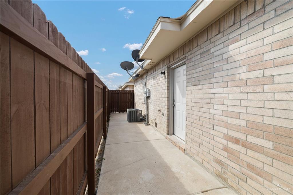 1214 Cornerstone Loop Rio Grande City, TX 78582 - Photo 12 of 15 a view of a pathway along the building