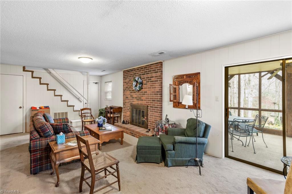 1393 Turkey Hill Road Winston-Salem, NC 27106 - Photo 22 of 36 Playroom opens onto screened porch