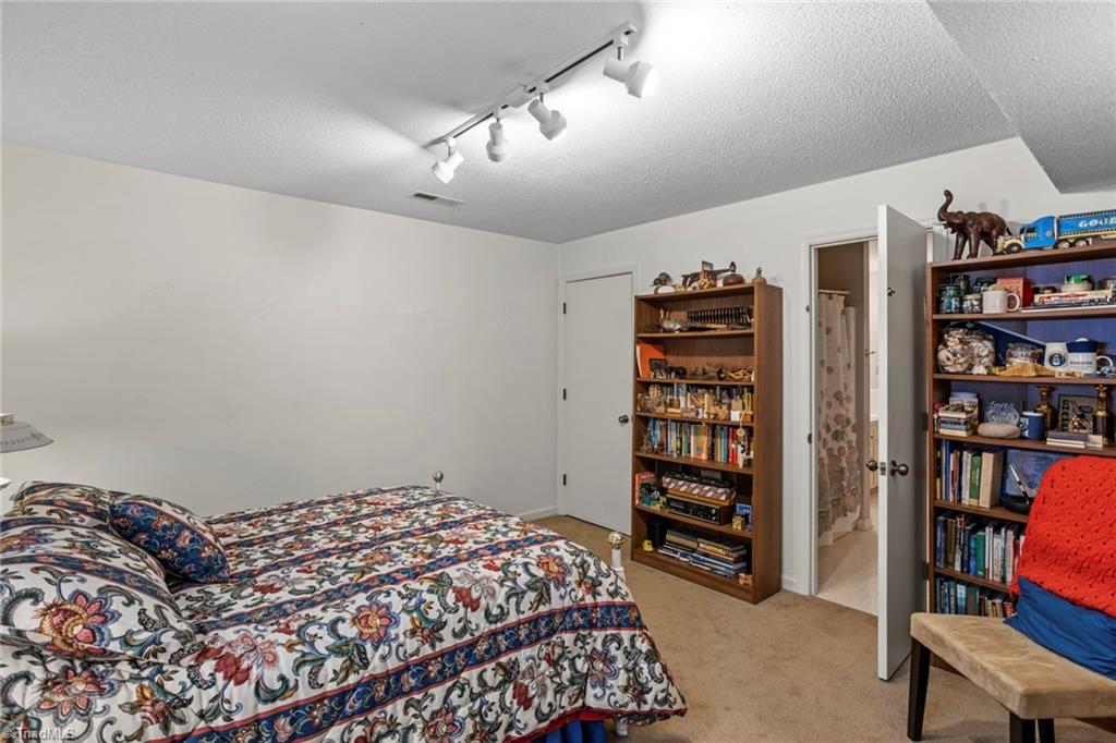 1393 Turkey Hill Road Winston-Salem, NC 27106 - Photo 25 of 36 Bedroom 4 has direct access to full Bath