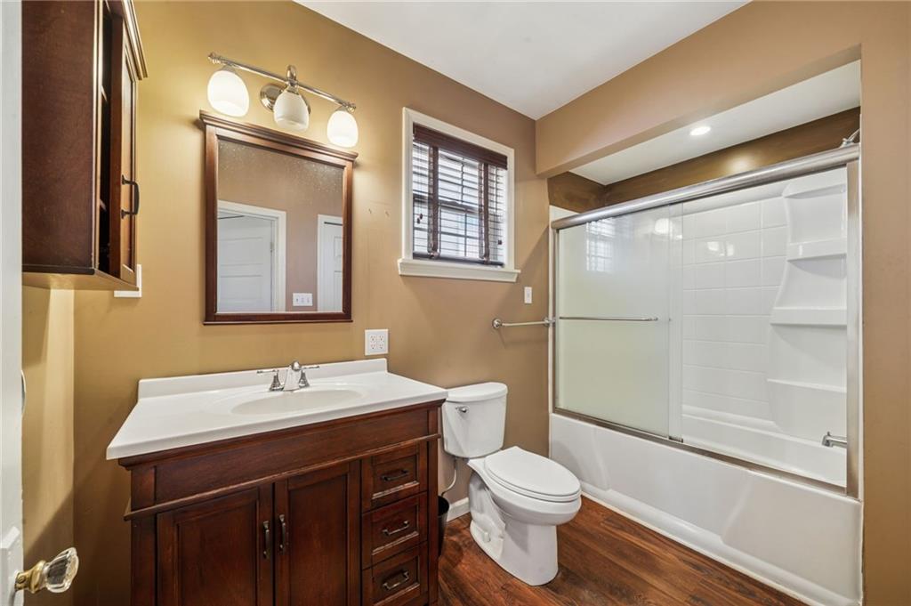 147 Hamilton Avenue Vandergrift, PA 15690 - Photo 25 of 32 a bathroom with a sink a toilet and shower