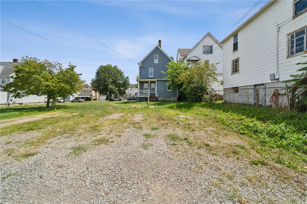 147 Hamilton Avenue Vandergrift, PA 15690 - Photo 31 of 32 front view of a house with a yard
