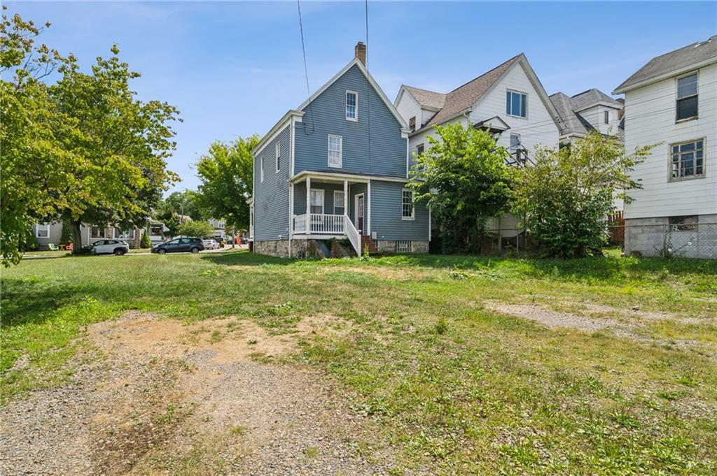 147 Hamilton Avenue Vandergrift, PA 15690 - Photo 32 of 32 front view of a house with a yard