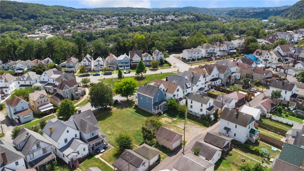 147 Hamilton Avenue Vandergrift, PA 15690 - Photo 5 of 32 an aerial view of multiple houses with yard