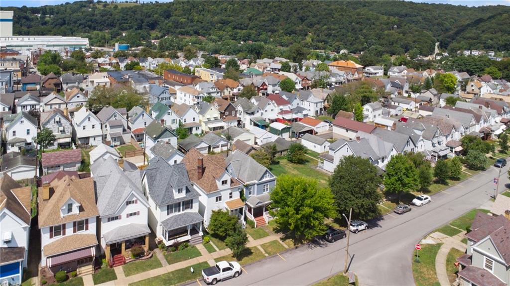 147 Hamilton Avenue Vandergrift, PA 15690 - Photo 6 of 32 an aerial view of residential houses with outdoor space