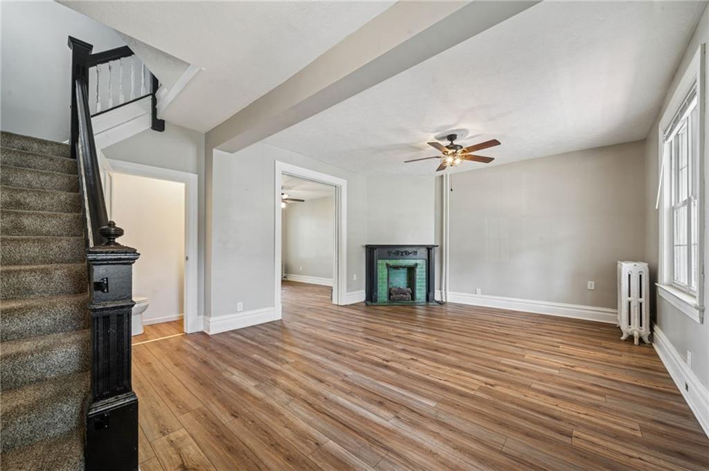 147 Hamilton Avenue Vandergrift, PA 15690 - Photo 7 of 32 a view of a livingroom with a fireplace
