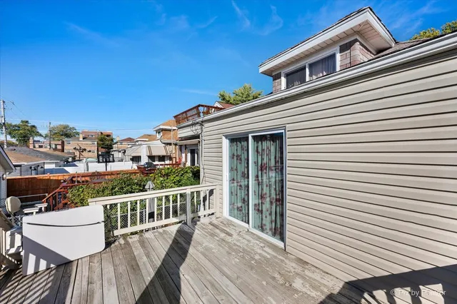 a view of a balcony with a patio