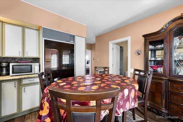 a view of a dining room with furniture