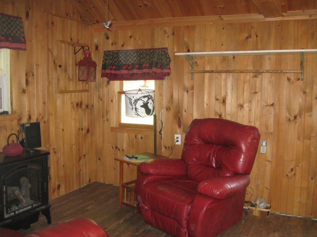 24 Demeritt Road Newfield, ME 04095 - Photo 10 of 19 10. Living Room - Gas Stove