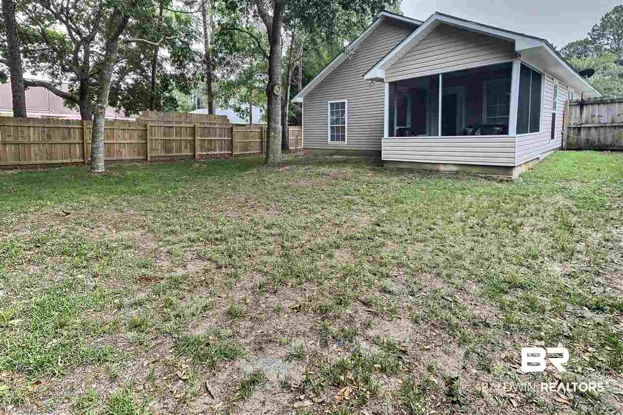 5113 Pine Way Orange Beach, AL 36561 - Photo 13 of 16 FENCED BACKYARD/STORE BOA