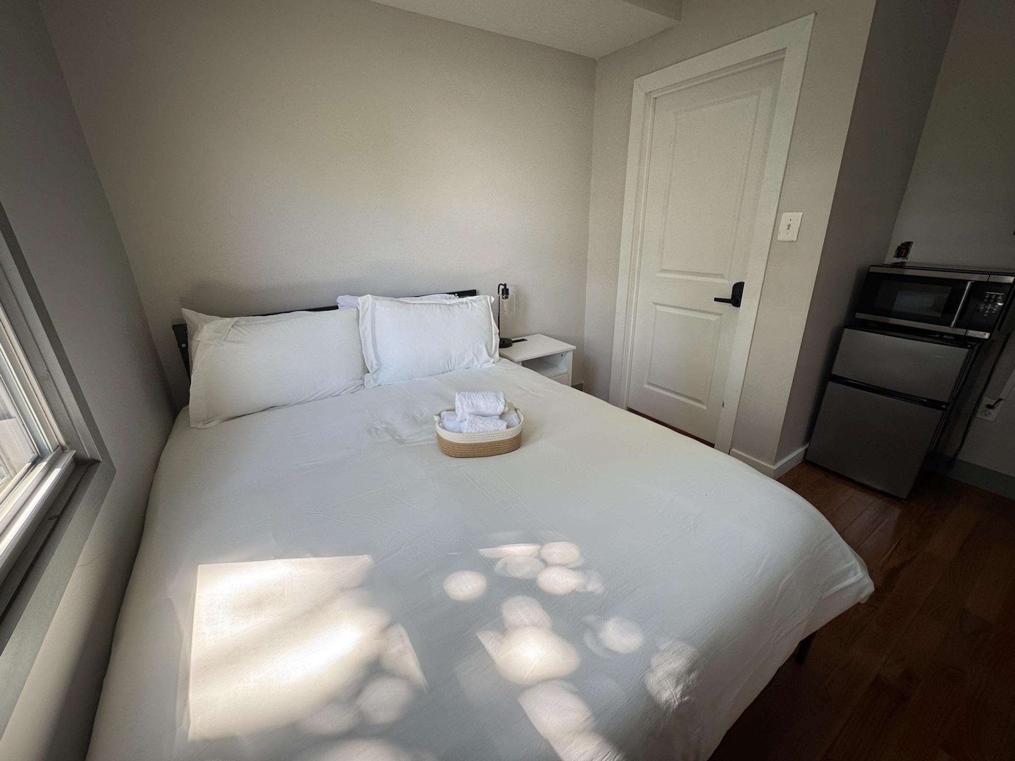 157 Bidwell Avenue, Unit 2 Jersey City, NJ 07305 - Photo 15 of 34 a close up of a bed