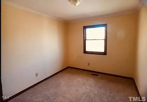 an empty room with a window