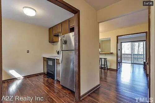 105 Lantern Way Carrboro, NC 27510 - Photo 2 of 9 a view of a hallway with wooden floor and glass door