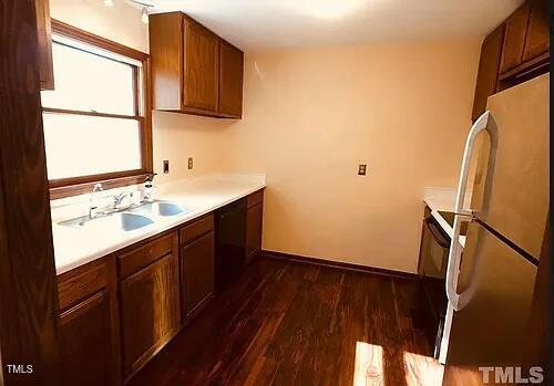 105 Lantern Way Carrboro, NC 27510 - Photo 3 of 9 a bathroom with a sink a mirror and a window