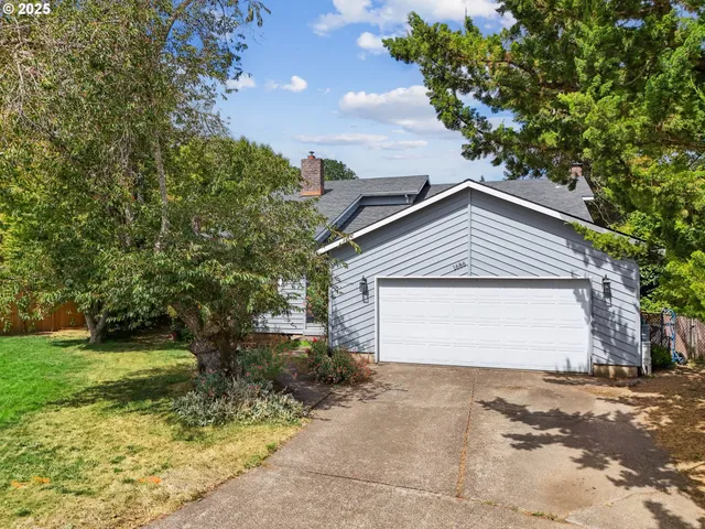 a front view of house with garden