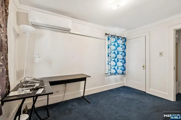 a room with window and a table