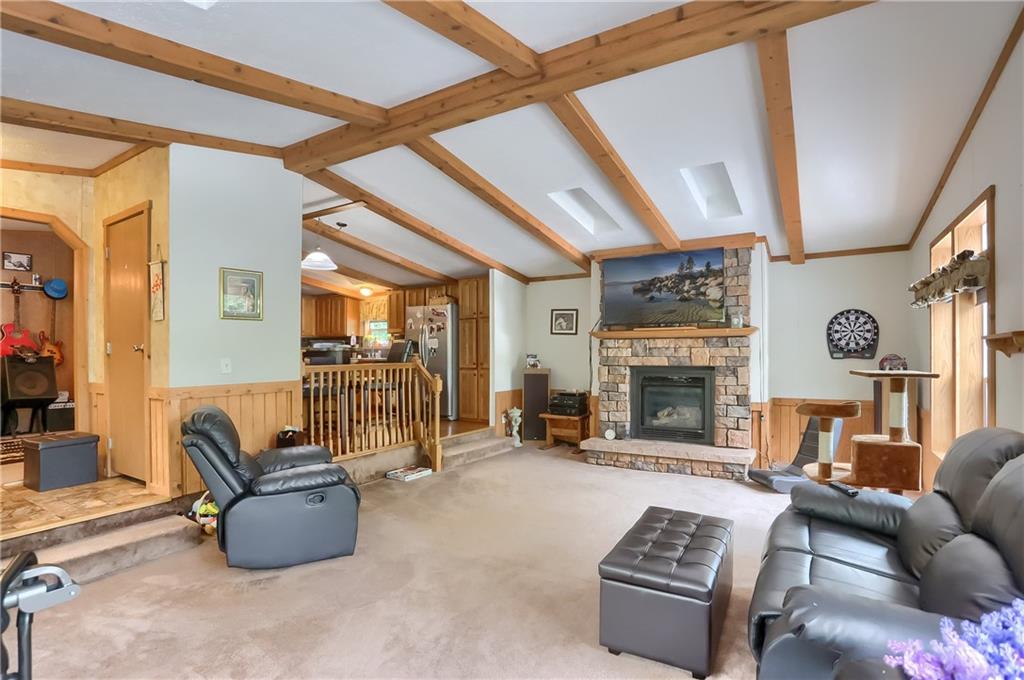 4425 State Rte 18 New Castle, PA 16102 - Photo 4 of 22 a living room with furniture and a fireplace