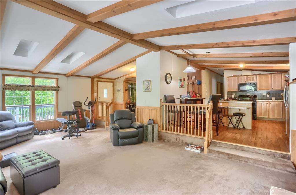 4425 State Rte 18 New Castle, PA 16102 - Photo 5 of 22 a view of a livingroom with furniture and floor to ceiling window