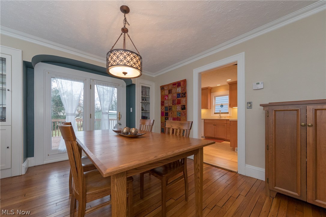 3996 Rosemond Road Cleveland Heights, OH 44121 - Photo 6 of 29 The Dining Room with garden view through the large panel window and door leading to the rear deck