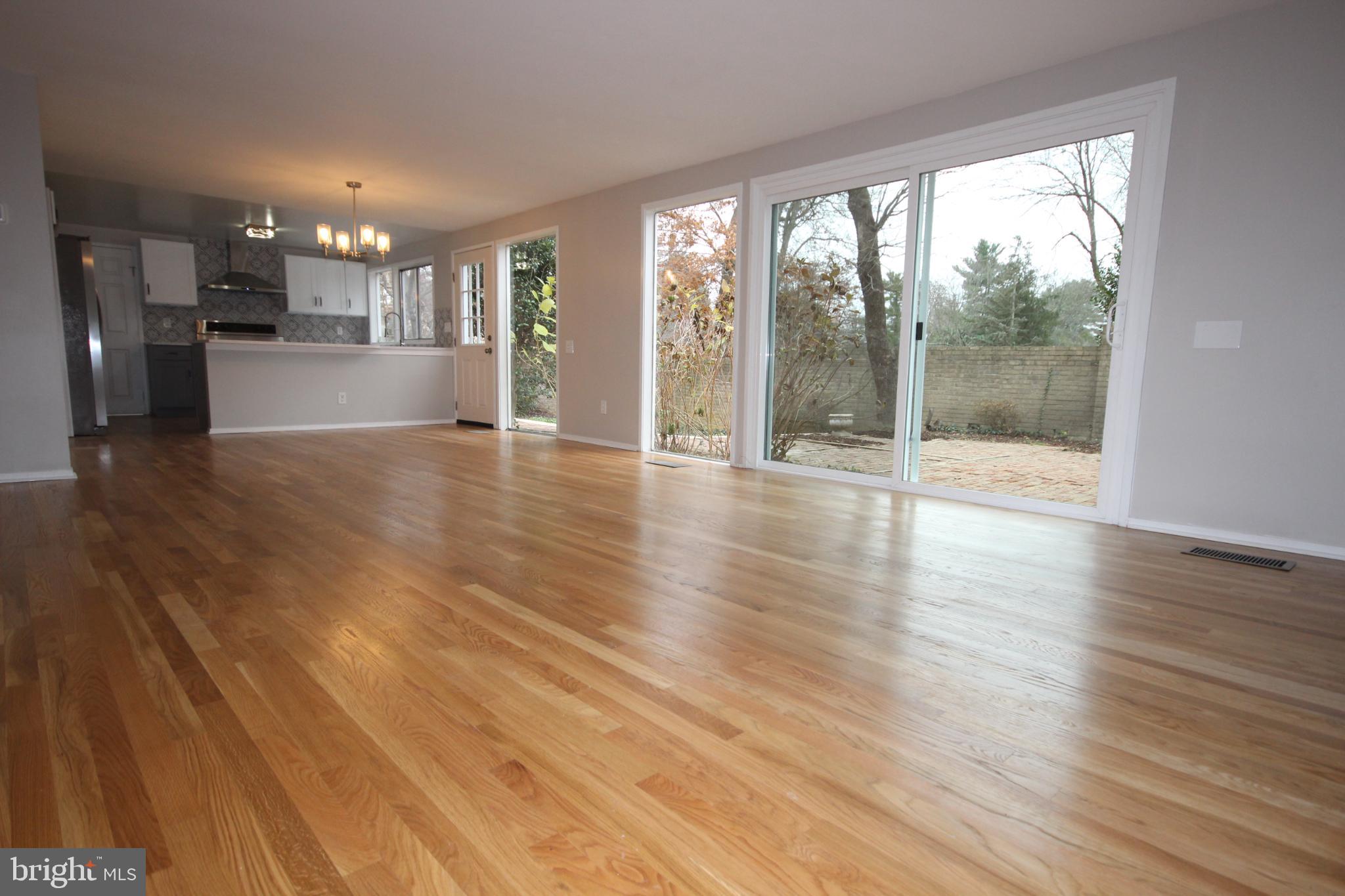 19115 Roman Way Montgomery Village, MD 20886 - Photo 13 of 67 Kitchen open to Family Room with lots of windows