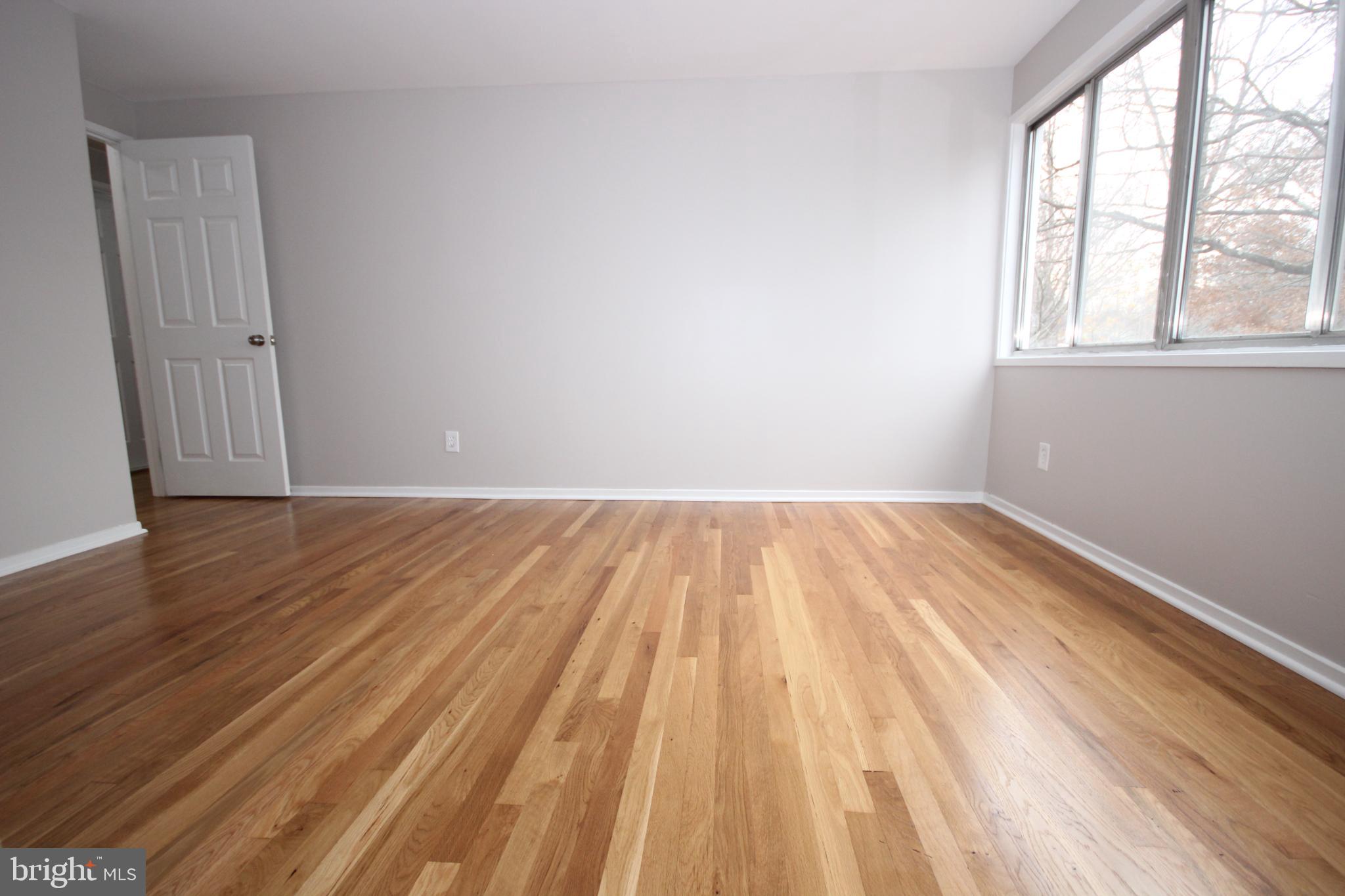 19115 Roman Way Montgomery Village, MD 20886 - Photo 48 of 67 wooden floor in a room