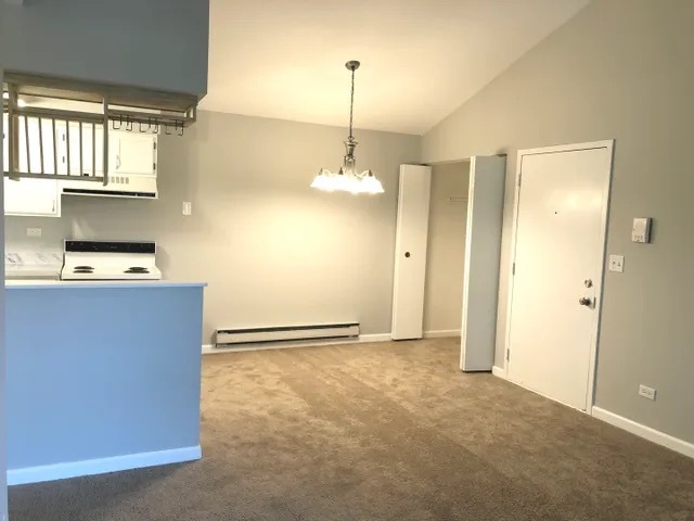 627 South Virginia Road, Unit 312 Crystal Lake, IL 60014 - Photo 2 of 13 a view of a kitchen with a refrigerator and window
