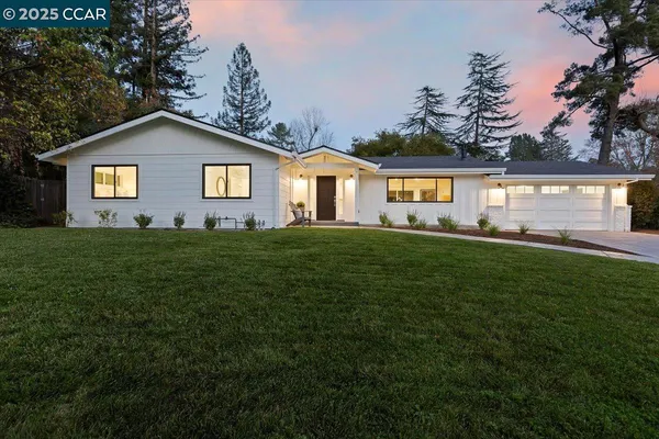 a house view with a garden space