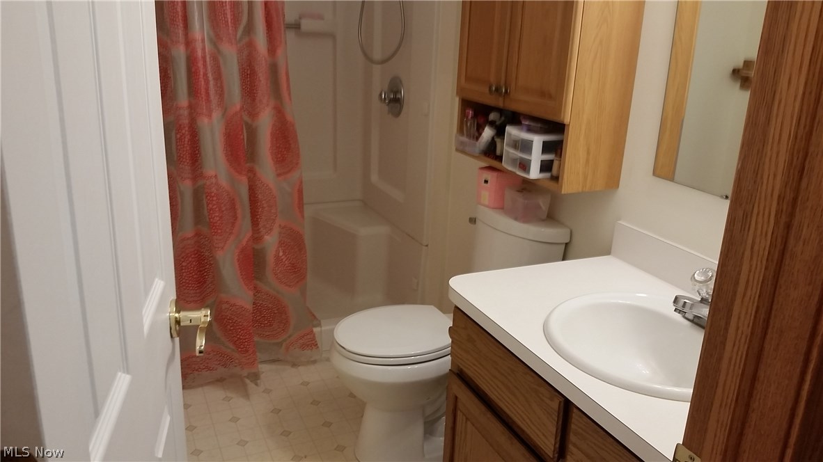 2123 Conwill Road Stow, OH 44224 - Photo 21 of 24 A full bathroom with shower shared by the 2 bedrooms.
