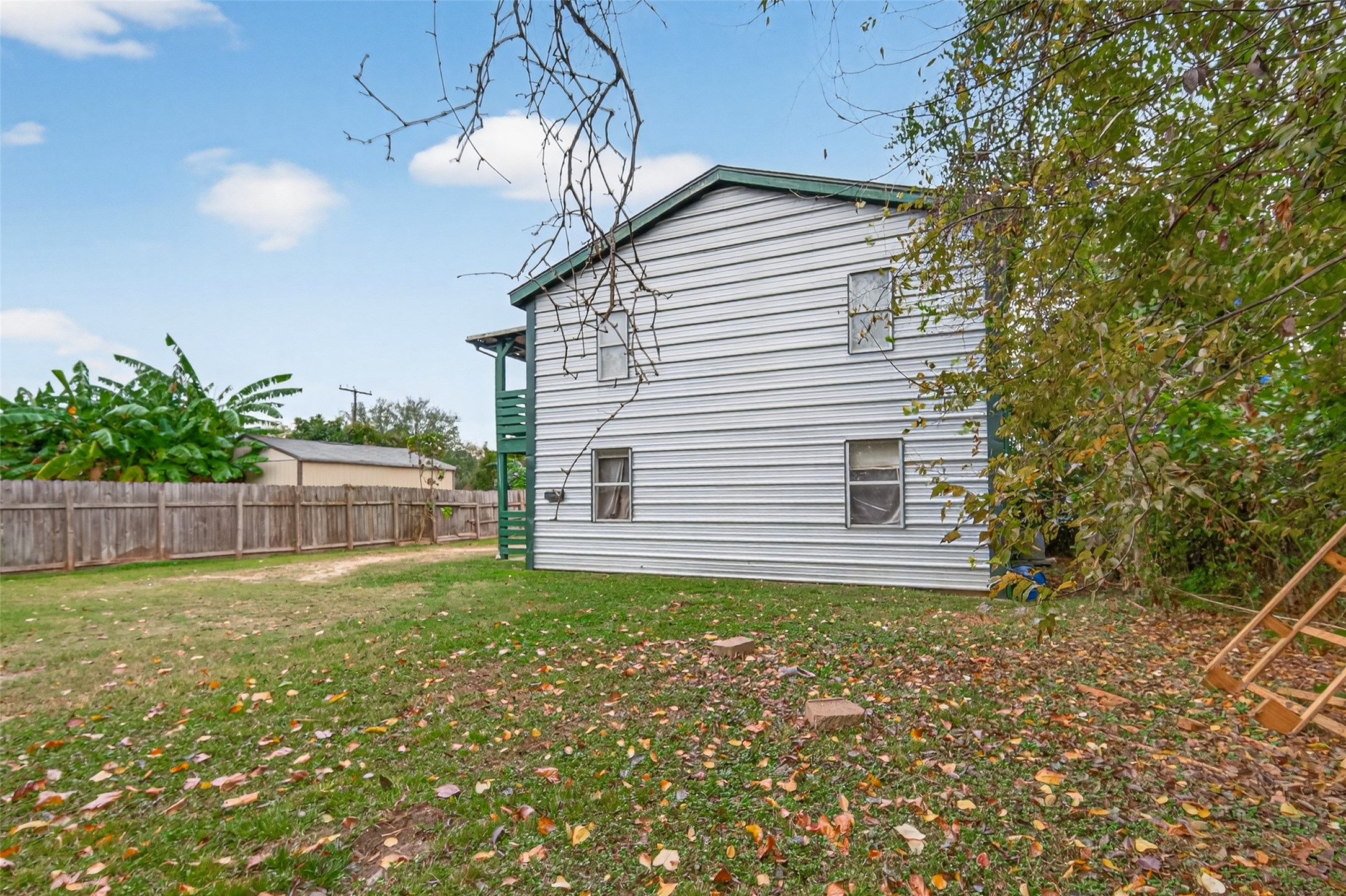 105 Clear Lake Road, Unit A Highlands, TX 77562 - Photo 25 of 25 a view of a house with a yard