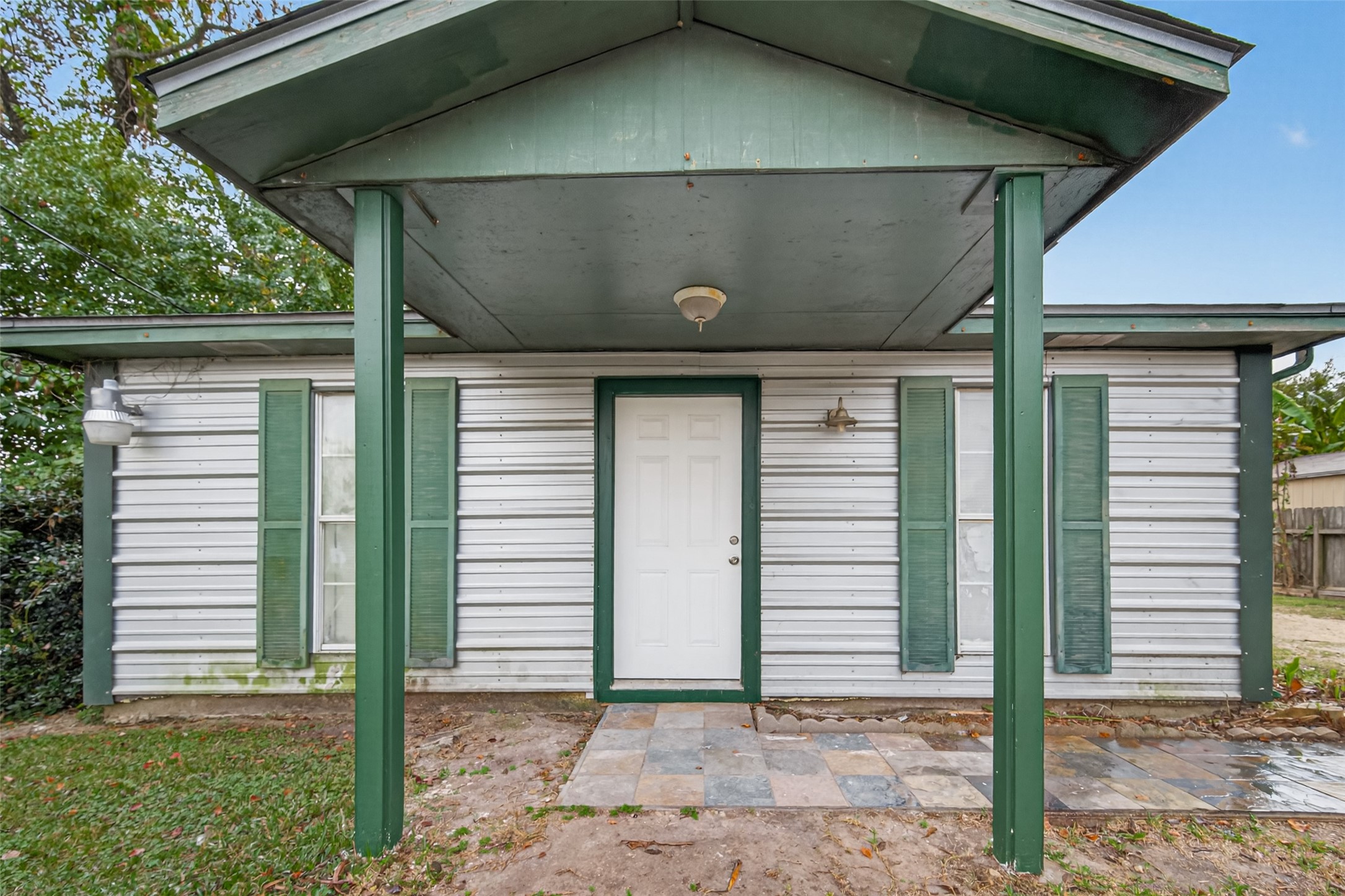 105 Clear Lake Road, Unit A Highlands, TX 77562 - Photo 5 of 25 a side view of a house with a garage