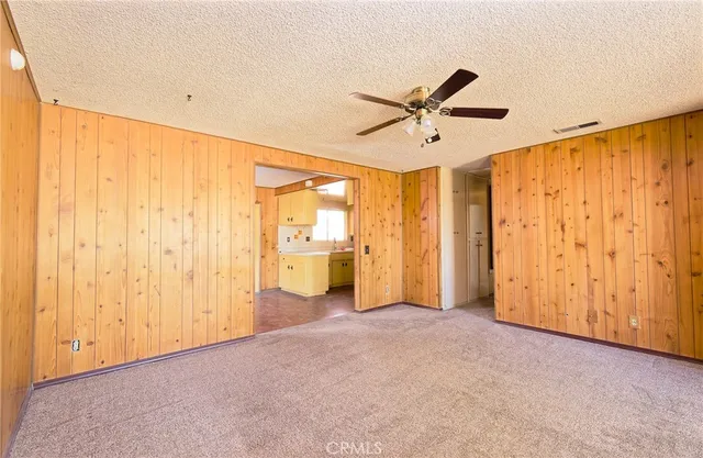 a view of a livingroom with a furniture and entryway